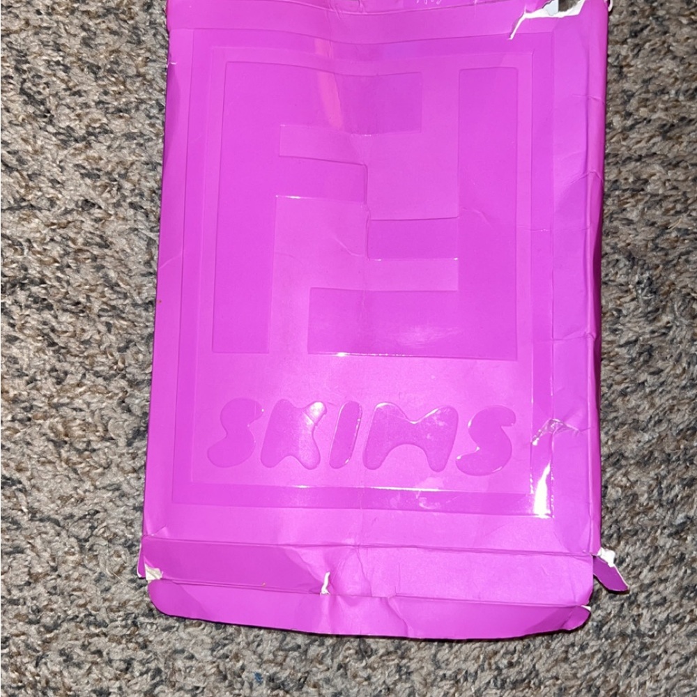 SKIMS Bold Pink Packaging